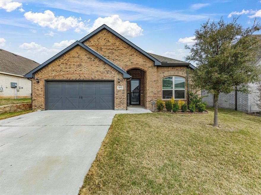 Showings Start this Saturday! This beautifully maintained 2,258 sq ft home by Impression Homes (built in 2021) offers thoughtful upgrades, modern features, and exceptional outdoor living in the highly sought-after Morningstar subdivision within Aledo ISD.
The open-concept layout is enhanced by a custom pony wall, creating a defined yet inviting transition between the dining and living areas. The kitchen features a huge kitchen island, upgraded hardware, a gas Whirlpool range, a walk-in pantry, and seamless flow for entertaining.
Significant upgrades throughout the home include a custom $2,000 front door, upgraded toilets, and additional ceiling fans installed in the guest room and outdoor patios for added comfort. Impossible to miss the huge walk in closet inside the primary suite. The guest bathroom is already plumbed for dual vanities, offering flexibility for future customization.
Step outside to an oversized covered patio, perfect for relaxing or entertaining. The backyard has been thoughtfully improved with $8,000 in upgraded landscaping and trees, including an additional $3,000 in rock, pavers, and gravel. 
Additional features include:
Gas fireplace
Gas water heater
Gas heating with electric AC
New Full gutter system
Roof only 4 years old
10-year foundation warranty (2021 construction)
This home combines quality construction, modern upgrades, and a prime location—making it a standout opportunity in Morningstar.