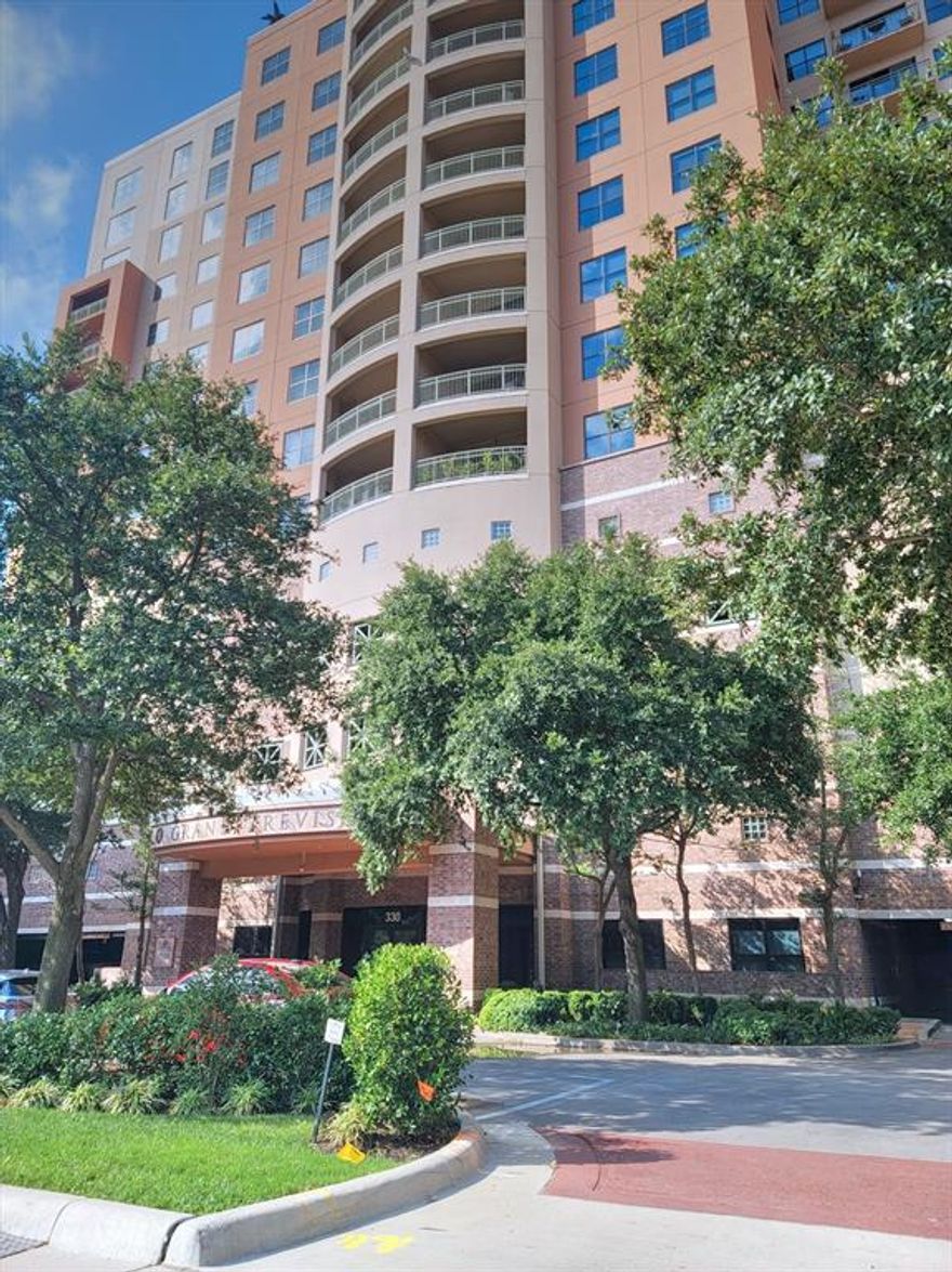 Grand Treviso is a one-of-a-kind, Executive Lifestyle, high-rise condo in the heart of Las Colinas, connected to the Mandalay Bay. This corner unit is located on the 4th floor with no one above. This unit is one of the largest 1-bedroom units and by far the best price per square foot.  1 bedroom, 1 bath with a Bonus Room that can be used as an office, hobby room, or relaxing area. Hardwood flooring is featured throughout, with tile installed in the kitchen and bathroom.  A large utility room with a full-sized washer and dryer included, featuring a secondary entry door from the hallway, allowing the owner to leave rubbish for weekly pickup. Unlike most units, this condo features a rare 2 DEEDED parking space.  Use it OR rent it out to other tenants.  Both parking spaces are conveniently located near the unit. Enjoy many amenities this Condo has to offer, from a resort-style pool with covered cabanas, outdoor grills, a Gym, a Havana room, and an entertainment TV room.  Mandalay Bay is connected with direct, easy access from the condo. 24-hour front desk concierge service, gated community parking, this Executive Lifestyle High Rise condo has it all.   The seller will pay for all special assessments at closing.
