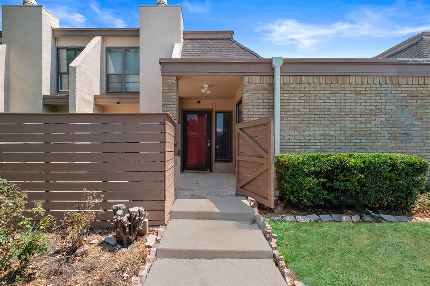 *Price to sell*
This two-story home features a desirable floorplan with the primary suite located on the main level, complete with an ensuite bath and a generous walk-in closet. Upstairs, a secondary bedroom offers built-in shelving and its own ensuite bath, perfect for guests or a home office. The spacious living and dining areas are perfect for entertaining, along by a charming brick fireplace and an inviting eat-in breakfast bar. Offering the privacy of no neighbors above or below. Step outside to your private, gated patio—ideal for morning coffee or evening relaxation. The HOA covers roof and foundation maintenance, covered parking, secured mailroom, access garbage collection, exterior and common area maintenance, front landscaping, community pool access, blanket insurance, pest control, shared laundry facility, hot & cold water (centrally supplied—no individual water heaters needed, so endless hot water!) Ideally located just 10 minutes from Dallas Love Field Airport, with easy access to major highways (635, 75, and the Dallas North Tollway), and close to parks, trails, and downtown Dallas—this home is the perfect blend of comfort and connectivity. *1 covered parking space*(assigned E21) and 1 uncovered spot. 
All information contained herein is deemed reliable but not guaranteed. Buyer and buyer’s agent to verify all information, including HOA, dimensions and schools. Broker and broker’s listing agent are not responsible for any inaccuracies.