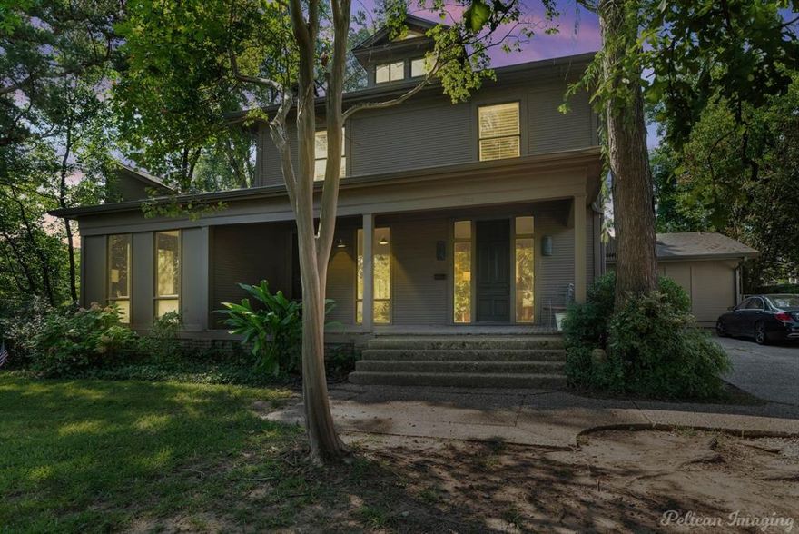 Heart of South Highlands on beautiful Delaware street this traditional home with a modern
flair has great space for entertaining and family living.  Inviting entry with spacious hallway
and pretty staircase.  Living room with wood floors and marble fireplace, opens to family 
room with windows.  Atrium area leads to great kitchen with stone counters, built in fridge
and freezer open to light and airy breakfast area overlooking expansive yard with deck.
Downstairs bedroom with full updated bath.  Separate stairs lead to recently updated large
bedroom and beautiful bath.   Four additional bedrooms and 2 baths are on the second story.