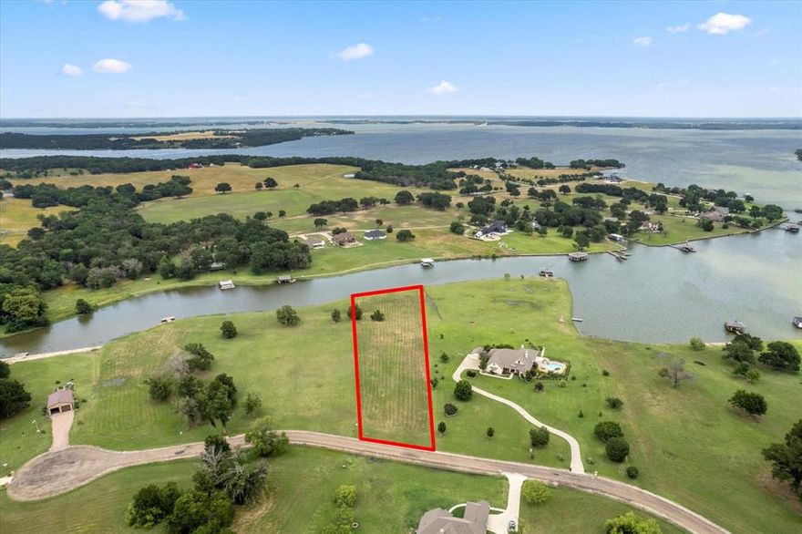 This is the waterfront lot of your dreams! Beautiful 1.8 acres with lake views galore to build the lake home you have always wanted. Vista Ridge subdivision is a hidden gem on Richland Chambers lake offering maintained paved roads, private boat ramp, pier and more!  Approximately 170' of water frontage.