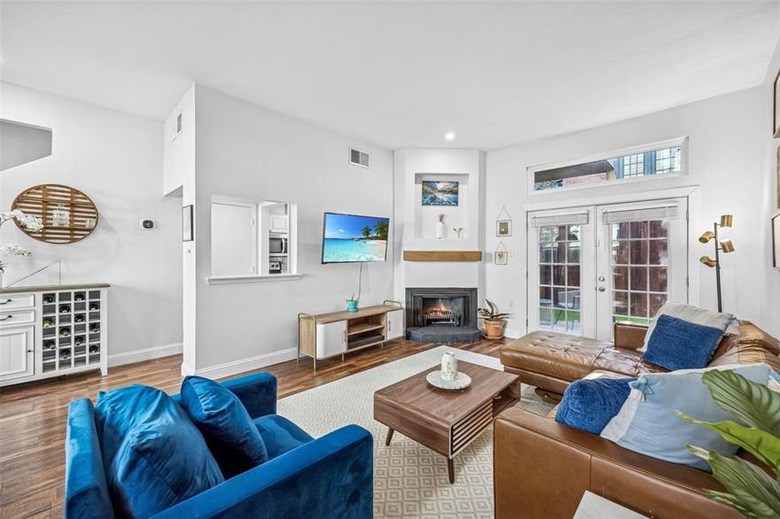 Bright and airy two-bedroom condo ideally positioned on a desirable block of Holland Avenue in North Oak Lawn, offering exceptional walkability to popular restaurants, parks, the Katy Trail, and vibrant neighborhood amenities. This thoughtfully updated residence combines comfort, style, and an unbeatable urban location.

The open living area features tall ceilings, abundant natural light, and a fireplace that creates a warm and inviting focal point. Wood flooring flows through the main living spaces, complementing the updated kitchen with granite countertops, stainless steel appliances, and ample storage. Both bathrooms have been tastefully updated with timeless finishes, making the home truly move-in ready.  HVAC system replaced Summer of 2023.

The two-story layout provides excellent separation of space, while rare outdoor features — including a private yard and patio plus a balcony — offer multiple options for relaxing or entertaining. Additional highlights include one covered and one uncovered parking space.

Enjoy low-maintenance living in one of Dallas’s most sought-after neighborhoods, with convenient access to Oak Lawn, Uptown, Love Field, and Downtown.  HOA dues of $350 per month cover : exterior maintenance, landscaping, pest control, and blanket insurance. **Floor Plan and Virtual Tour Available**