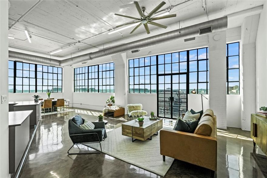Experience the perfect blend of modern elegance and historic character in this fully renovated, loft-style penthouse condo, located in the heart of Downtown Dallas. This corner unit features 2 bedrooms, 2 bathrooms, and an expansive open-concept living area designed for comfort and style.

Industrial-chic touches include soaring ceilings, custom concrete floors, and oversized windows that flood the space with natural light and showcase sweeping views of the Downtown skyline. The kitchen is a dream for any home chef, boasting sleek custom countertops, an electric cooktop, breakfast bar, and ample storage.

Retreat to the private primary suite, complete with unbeatable skyline views and a completely updated primary bathroom featuring a custom tile walk-in shower and large soaking tub.

Enjoy quick access to the building’s rooftop pool and observation deck, offering breathtaking panoramic views. Located just steps from the iconic Dallas Farmers Market. 

Additional amenities include in-unit laundry, concierge service, and secure parking.

Don’t miss this rare opportunity to own a stylish urban sanctuary—schedule your showing today!