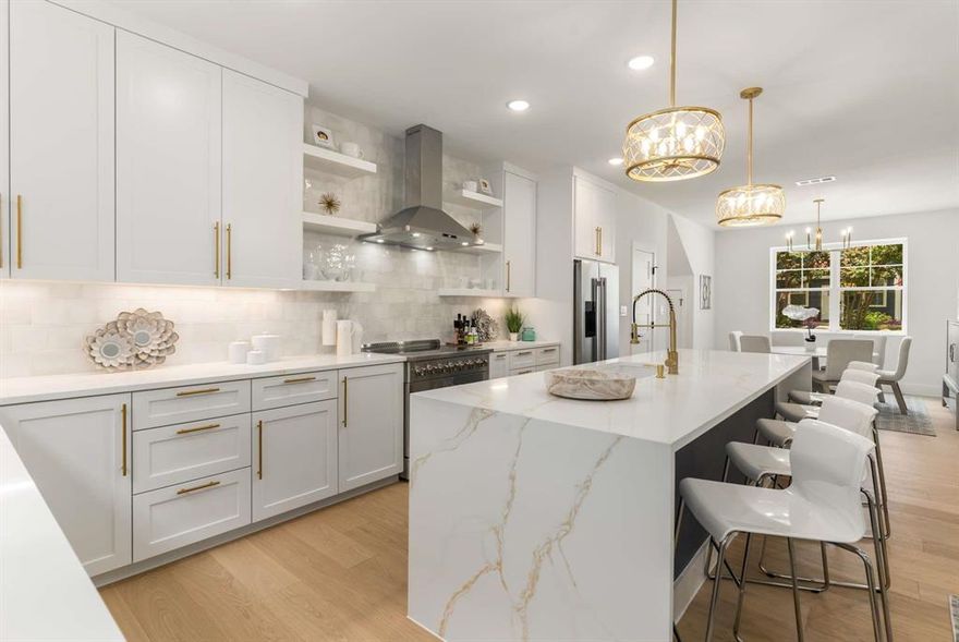 Premium New Construction with Elevated Finishes and a Low-Maintenance Design in Downtown McKinney. This exceptionally built home showcases thoughtful architecture, upgraded structural features, and luxury finishes typically found in higher-end custom homes. Positioned on a desirable corner lot, it delivers a low-maintenance lifestyle supported by durable materials, quality craftsmanship, and a functional floor plan that suits modern living. Beautiful wood flooring extends throughout the main living areas, enhancing the open-concept design anchored by a sleek modern fireplace. A private study offers a dedicated workspace. The chef’s kitchen is appointed with quartz countertops, a striking waterfall island, soft-close cabinetry, built-in spice racks, trash pullouts, and upgraded stainless steel appliances including a Forno professional-style French door convection range, microwave drawer, and refrigerator. The spacious primary suite features a spa-inspired ensuite with dual quartz vanities, a freestanding soaking tub, and a frameless glass shower with a built-in niche and a generous walk-in closet. A private guest suite includes its own ensuite bath with a frameless shower, while two additional bedrooms share a well-designed Jack-and-Jill bath with dual vanities with quartz countertops. With elevated construction, premium finishes, and smart pricing for today’s market, this home offers exceptional livability and value within McKinney ISD.