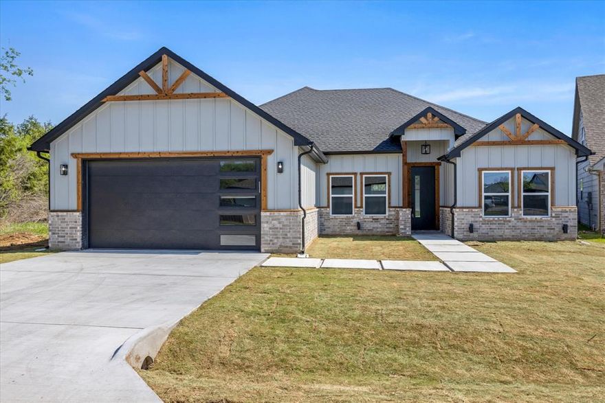 Beautiful New Construction with Vaulted Ceilings & Great Backyard! This thoughtfully designed 3-bedroom, 2.5-bath new construction home combines modern style with everyday comfort. The living room features soaring vaulted ceilings and track lighting, creating an open and inviting space.
The eat-in kitchen offers casual dining options along with a built-in wine cooler—perfect for entertaining—while the formal dining room is ideal for hosting special gatherings. The spacious primary suite provides a relaxing retreat, complete with a walk-in shower and a well-designed layout. Each bedroom includes ceiling fans, and the home also features a functional mud area for added convenience. Enjoy outdoor living with a covered back porch that overlooks a nicely sized backyard—perfect for relaxing or entertaining without the maintenance of a larger lot. The 2-car garage rounds out this beautiful home in style. Don’t miss your chance to own this stunning new build!