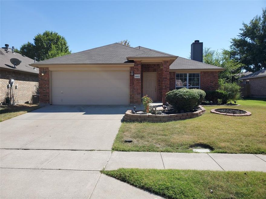 Move-in ready brick home with a spacious kitchen and walk-in pantry.  A huge family room with a fire place, security alarm and sprinkler system.