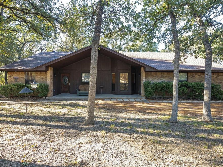 Welcome to this beautiful 3 bedroom, 2 bathroom home located in the desirable Seven Wires Subdivision in Decatur, TX. The house features a 2 car garage for convenient parking and storage with circle drive way. Surrounded by lush, heavily wooded areas, this home provides a peaceful and serene setting for you to relax and unwind. Lease includes 32X40 Shop · Client must view the property before applying online (tenants need to attach supporting docs via online app). $60 application for applicants 18+. Application fee is non- refundable. $150 admin fee due at lease signing. Security deposit $2495. Owner has final approval. All information is deemed reliable but not guaranteed - Tenant and or Tenant's agent to verify all information within the listing included but not limited to square footage and schools.