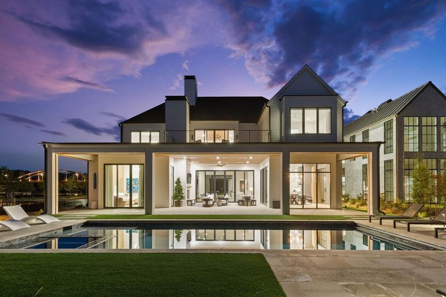 No details overlooked in this stunning lake home at Long Cove, and a perfect sunset view to top it off.  Turn key and ready for summer at the lake!  This beautiful home features open, spacious living spaces to entertain the whole gang.  An office, workout room, tanning deck, game room, swimming pool and outdoor fire pit will keep you entertained indoors and outdoors - and only steps from all the ways to play at Long Cove.  The lake club, hiking and biking trails, court sports, golf, putting, fishing ponds and so much more.  1200 acres are yours to explore when you're not enjoying this immaculate lake house!