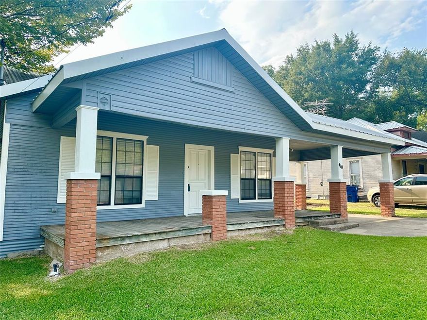 Beautifully well maintained 3 bedrooms, 2 bath, 2 living home on .321-acre lot. Exterior freshly painted. Large living area with a fireplace. Original hardwood floors throughout most of home. Primary bedroom walled with cedar planks, several closets, single vanity & tub shower combo. Kitchen with plenty of cabinet and counter space, gas range & dishwasher. Electrical panel replaced several years ago. Covered front porch & carport. Large workshop with concrete and electric can be turned into an oversized 2 car garage, Storage shed stays with home in backyard. You will not be disappointed with this amazing home.