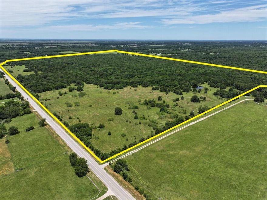 Presenting a premier investment and development opportunity: a 214-acre tract along FM 148 in Scurry, Texas. This expansive property offers substantial frontage and is strategically located outside city limits, free from zoning restrictions and extraterritorial jurisdiction (ETJ), providing unparalleled flexibility for various land use endeavors. Approximately 15% of the land features a central creek corridor, as indicated by FEMA floodplain overlays, adding natural beauty and potential for water resource management. Essential utilities, including co-op water and electricity, are readily available nearby, facilitating seamless development. Scurry is experiencing significant growth, with a projected population increase of 5.9% annually, reaching 926 by 2025 . The median household income stands at $108,125, surpassing both state and national averages . Infrastructure enhancements, including improvements to FM roads and Highway 175, further bolster the area's appeal . Additionally, the property is just a 25-minute drive to Cedar Creek Reservoir, offering recreational opportunities and contributing to the area's desirability. This 214-acre offering presents a rare chance to invest in a rapidly developing region of Texas, combining agricultural potential with strategic location advantages.