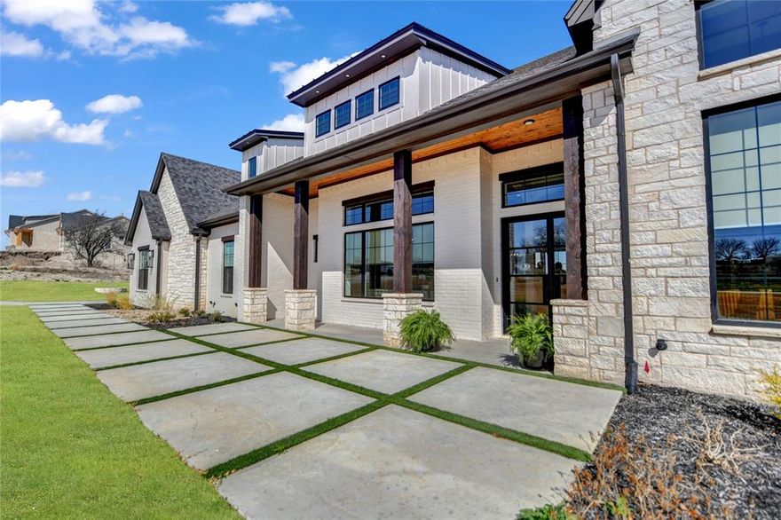 5889 sq feet of livable space!!! This stunning, CT custom home offers 4 bedroom and 5 and half baths with a thoughtfully designed layout that blends luxury, comfort, and functionality. Inside wood floors throughout, striking ceiling beams add warmth and character to the interior. The home features a dedicated office, and inviting media room, and a spacious game room, providing plenty of room to work, relax, and entertain. The kitchen is truly a gourmet kitchen with large working pantry, custom cabinetry, and dedicated wine room. Primary bedroom has a sitting area and a spa bathroom with a steam shower. Home is energy efficient with quality construction spray foam. heat pump and gas water heater. Step outside to your private patio retreat with an outdoor kitchen, fireplace, pool with spa, putting green, and magnificent views for miles. The outdoor living experience is completed by a 1125 sq feet pool house with a bar and serving window and a fire pit. Total of 5,889 of livable sq footage. Home is wired with a sound system throughout inside and outside the house. This home is top notch through and through.