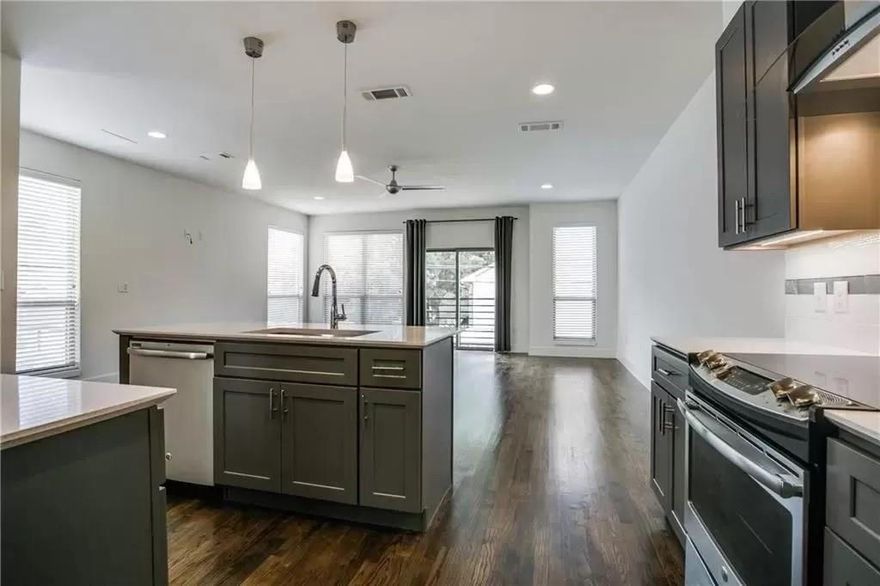 Beautiful 2 bed and 2.5 Bath Townhome close to Katy Trail and Travis Walk! This unit includes a Roof Top Deck, a Study and a 2 Car garage! Hardwoods throughout with contemporary finish out and designer lighting. Open Kitchen with Quartz counters, island & stainless appliances that opens to the living and dining areas!