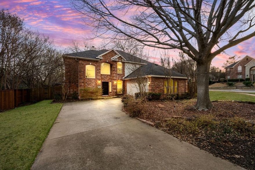 Come see this beautifully updated north-facing 3-bedroom, 2.5-bath, two-story home on a premium corner lot in highly desirable Watters Crossing in Allen. One of the largest lots in the neighborhood, this home offers exceptional outdoor space and an unbeatable location within walking distance to Watters Creek Village, scenic mile-long walk and bike trails along Watters Creek, and quick access to U.S. Route 75 and Sam Rayburn Tollway for an easy commute. The welcoming entry opens to a light-filled floor plan featuring updated lighting, warm wood flooring, and a seamless flow designed for everyday living and entertaining. The gourmet kitchen shines with quartz countertops, stainless steel appliances, and a breakfast bar that opens to the dining and living areas — perfect for gatherings. The main level includes a bright living room with large windows and a cozy see-through fireplace shared with a private office or flex space. Upstairs, you’ll find three spacious bedrooms, including a relaxing primary suite with a beautifully updated en-suite bath featuring dual vanities, a soaking tub, frameless glass shower, and a large walk-in closet. Enjoy brand-new hardwood floors throughout the upstairs and flex space — with no carpet anywhere in the home — offering a clean, modern, and low-maintenance lifestyle. Step outside to a wonderful deck overlooking the expansive private backyard, complete with a fire pit area, gazebo, and landscaped dry creek bed, creating the perfect setting for entertaining or relaxing. Community amenities include two pools, with one just a short two-minute walk away. Move-in ready and perfectly located, this home offers comfort, style, and convenience all in one.