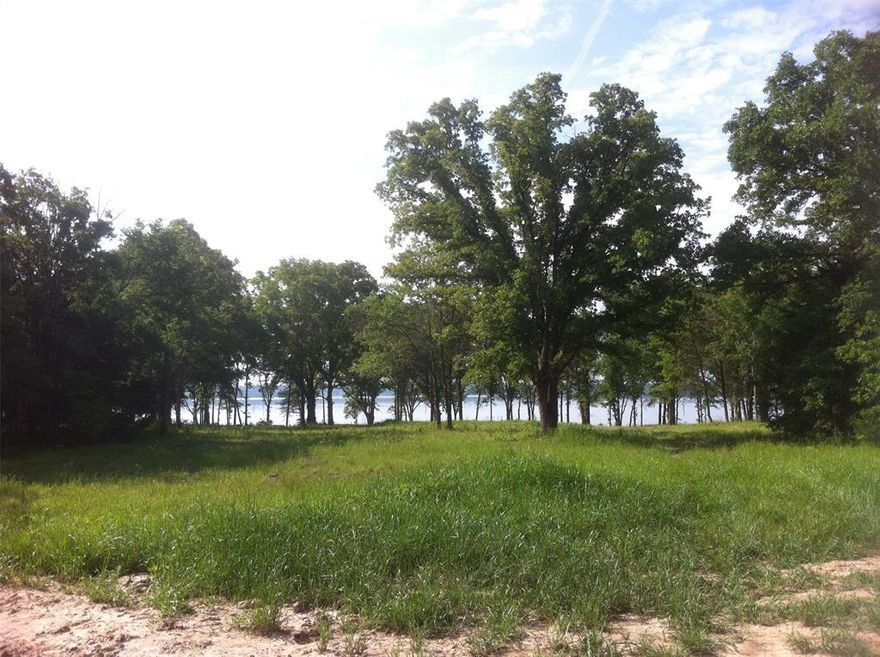 1.5 acre lot outside of Quinlan. Somewhat shallow lot.