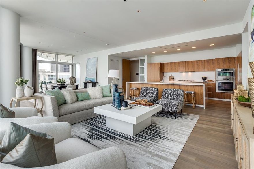 A true statement in contemporary architecture, Museum Tower anchors the Dallas Arts District as its most exclusive, purely residential building.  The 42-story tower sits on idyllic Klyde Warren Park and this home offers a RARE 3B, 3B combination.  Enter the home via private elevator access featuring beautiful motorized draperies and shades, private terrace, and fresh hardwood floors. Bathrooms are ensuite in every bedroom. 
Enjoy heated and cooled pool, spa, fitness, 2 guest suites, house car and drive, 24 hr concierge and other luxury amenities.
Parking:  65,66.  Storage:  2