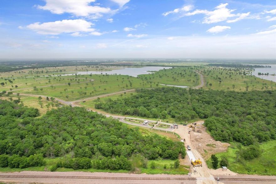 Craft your ideal lake home and experience the ultimate blend of country and lakeside living on Lot 238 at the Waterfront Club subdivision, encompassing almost 3 acres of soaring trees - an ideal choice for outdoor enthusiasts. The Water Front Club subdivision features well-maintained paved roads, a club house with a pool, a fire pit, and mini golf, providing a sense of living in a secluded paradise. The upscale Water Front Club community offers all the luxurious amenities of lakeside living just 5 minutes from Historic Downtown Corsicana and an hour from Downtown Dallas. The strategic location ensures effortless travel to access I-45, heading north or south and State Hwy 31, for quick transport east or west. The Waterfront Club deed restrictions require a site built home, with a minimum of 1,600 sq ft, the lot may not be subdivided, and there is a maximum of one single family resident allowed on the lot.