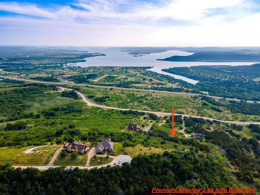WOW! Sprawling lake views paired with surreal valley backdrop create an unparalleled build site! Plan your custom build to captivate a scenic landscape from every side. Honeysuckle Ct is one of the highest & most desirable peaks in The Hills Above community at Possum Kingdom Lake. Because of the convenient typography, home could sit on a ridge line with 'straight down the pipe' views of PK Lake at the front while simultaneously having valley views from the back of home. At 2.5 acres, it is so very rare to find this amount of acreage with these kinds of views. If you've been looking for THE best views to build your dream lakehome on, THIS IS IT! Hills Above owners enjoy the benefits of being in a private gated community, boat ramp, courtesy boat dock, Richie Cabin, fishing pond, infinity pool overlooking the lake, fitness center, boat storage and much more!