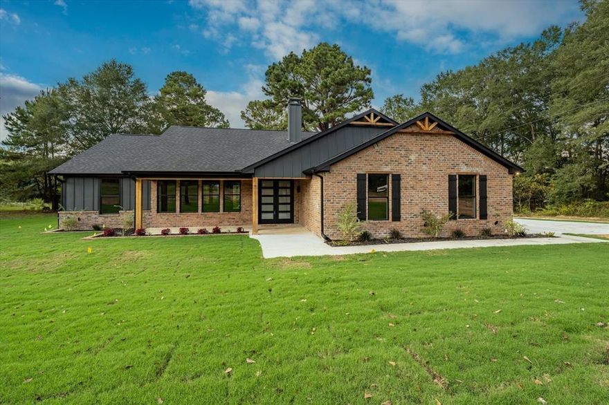 REDUCED RATE as low as 4.5% offered-call for details. Welcome to your dream home in the heart of East Texas! This sleek new construction offers the blend of luxury, privacy, and wide-open space with 4 spacious bedrooms, 3 full bathrooms, and 2.02 acres of scenic countryside views—all with no HOA restrictions in Bullard ISD. Thoughtfully designed with modern living in mind, this home features an open-concept layout, high ceilings, and large windows that flood the space with natural light. The gourmet kitchen has custom cabinetry, a large island, and sleek finishes, opening up to a warm and inviting living area—ideal for entertaining or quiet evenings at home. The primary suite is a peaceful retreat with a spa-like bathroom, double vanities, a soaking tub, and an oversized walk-in shower (84 sq ft). Three additional bedrooms offer flexibility for family, guests, or a home office setup. Step outside to enjoy panoramic views of rolling pastures and endless skies. With over 2 acres, there’s plenty of room to build a shop, add a pool, or simply enjoy the tranquility of country living—just minutes from Bullard ISD schools, shopping, and Lake Palestine. Don’t miss this rare opportunity to own a brand-new home on acreage with no HOA. Your Texas lifestyle awaits!