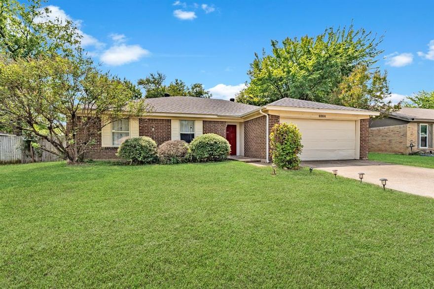 This charming brick home offers 3 bedrooms and 2 baths with an open-concept design that feels bright and inviting from the moment you walk in, featuring soaring ceilings, a cozy fireplace, and a spacious kitchen with an island, abundant cabinetry, and crisp white finishes. Durable laminate and tile flooring run throughout for easy care, while generously sized bedrooms with ceiling fans provide year-round comfort. Step outside to enjoy a fenced backyard and patio ideal for relaxing or entertaining, all with no HOA restrictions. Conveniently located near The Parks Mall, Arlington Highlands, Harold Patterson Sports Center, and Stovall Park, and served by highly regarded Kennedale ISD, this move-in ready property is the perfect blend of comfort, style, and location.***Seller is motivated******