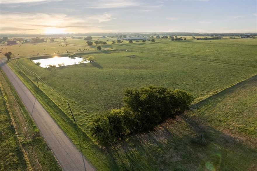 Approximately 62 acres in Grayson County, Texas, fenced and cross-fenced with well-maintained 5-strand barbed wire, suitable for cattle or horses. The property features a centrally located pond providing a water source for livestock or agricultural use. Open terrain allows for efficient access, grazing, and rotational livestock management.

Co-op utilities, including electricity and water, are available along the road frontage, offering flexibility for future improvements. The tract is positioned within a strategic North Texas corridor with access to multiple metro areas, including Dallas, Fort Worth, and Oklahoma City.

Convenient proximity to major transportation routes such as US Highway 82, State Highway 377, TX-289, Dallas North Tollway, and Interstate 35 supports ease of travel, hauling, and logistics. Regional airport access includes DFW International Airport, Dallas Love Field, McKinney National Airport, and North Texas Regional Airport.

Nearby regional destinations include Lake Ray Roberts, the PGA of America Headquarters, The Star in Frisco, and the Hagerman National Wildlife Refuge. Additional attractions such as Texas Motor Speedway, Bois d’Arc Lake, and Broken Bow, Oklahoma, are within driving distance.

Nearby communities include Whitesboro approximately 10 miles, Sherman approximately 25 miles, Gainesville approximately 30 miles, Denton approximately 40 miles, Dallas approximately 75 miles, and Fort Worth approximately 90 miles.

This tract presents an opportunity for livestock operations, recreational use, long-term investment, or future development in a growing North Texas market.
