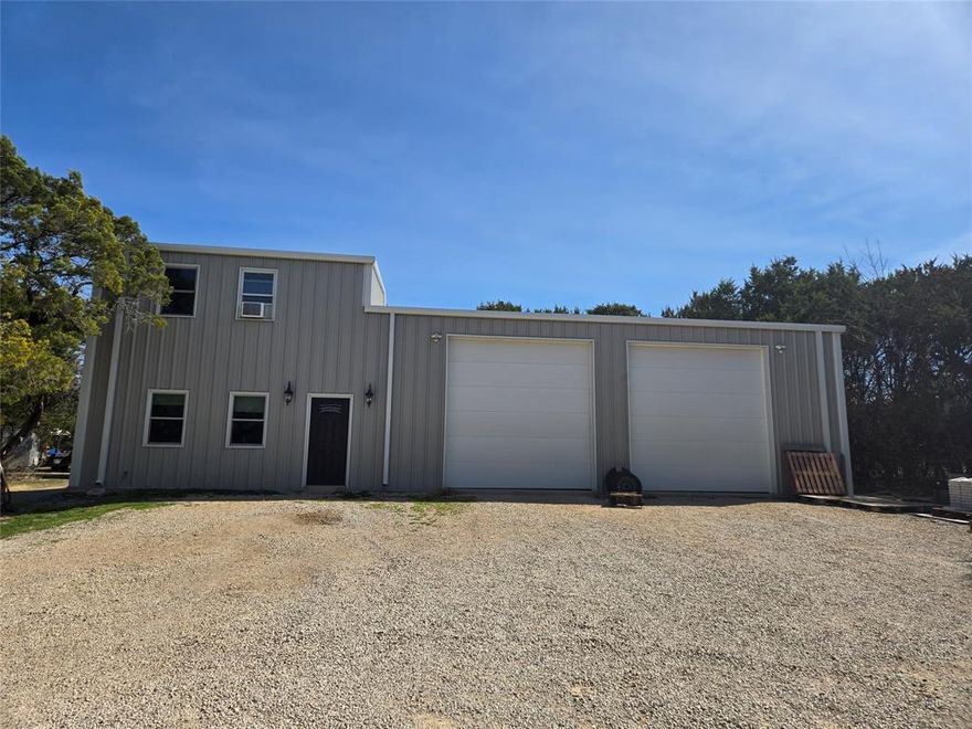 Rare Live-Work Opportunity on 2.93 Acres in Azle! 
Discover the ultimate flexibility at 134 Cedar Creek Dr. Built in 2017, this unique 4,000 sq ft property is perfectly designed for entrepreneurs, hobbyists, or those seeking a modern barndominium lifestyle. 
FIRST FLOOR (3,000 SQ FT): Consists of 1,000 sq ft of professional, climate-controlled office space and 2,000 sq ft of high-ceiling warehouse-shop space. Ideal for a home business, studio, or extensive equipment storage. 
SECOND FLOOR (1,000 SQ FT): Features a private 1-bedroom apartment, offering a modern, self-contained living retreat with total separation from the workspace below. 
EXTERIOR: Situated on nearly 3 sprawling acres in the peaceful Shangri La Home Sites with no HOA restrictions. Enjoy the freedom to further customize your land or add more structures. 
Located in the Azle ISD and just minutes from Eagle Mountain Lake, this property offers a quiet Parker County setting with easy access to city amenities. Consolidate your life and business in one prime location!