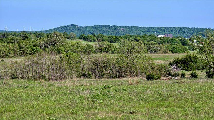 Views! This best describes this beautiful ranch. Located just west of St Jo Texas and east of Nocona Texas this property is near the old community of Bonita and sits in the heart of the North Texas hill country. From atop the highest elevation of this property one has views to the west, north and east. On a clear day it is easy to see all the way to Oklahoma which is 10 miles to the north. Offering the best of both worlds this ranch has bottom land with large trees and hills with views and mature oak trees. This property has 6 ponds, with the ability to expand or build new larger ponds. Great road frontage along Odom road provides access to the property and there is already electric service on site. The entire perimeter is fenced with barb wire and is in good condition. Cross fencing is in place for livestock and there is a 24 acre fenced area that serves as a wildlife preserve to hold game animals and allow for bedding. Deer, turkey, pigs, dove, all call this property home. You will not want to miss an opportunity to own one of the best properties in Montague County that has excellent potential.