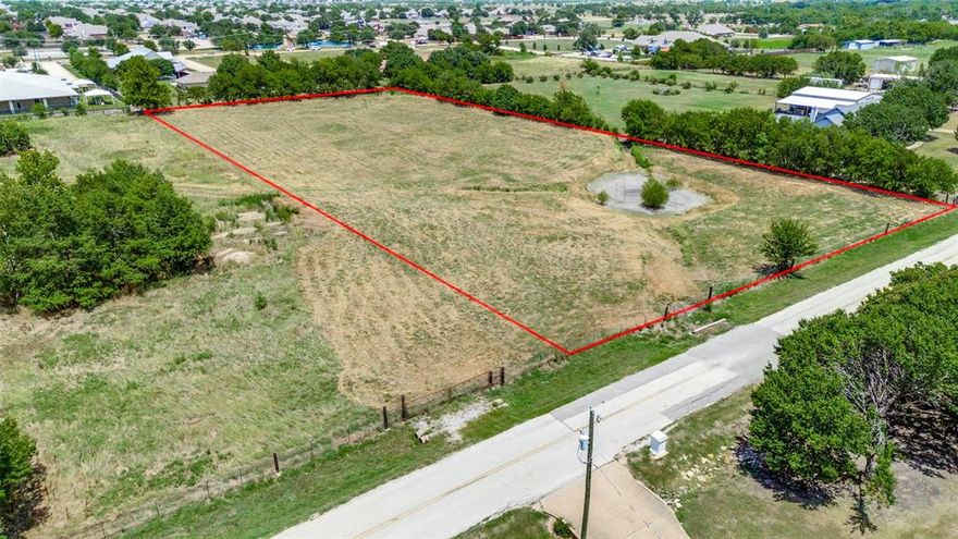 3 acres from the larger 10 acre parcel commonly referred to as 1380  Boaz Road--  See metes and bounds survey in document storage.  Property is 3.0 acres with no improvements.  There is a stock tank and currently fence on 3 sides.  Property is located in Tarrant County- no City taxes.  No utilities- Buyer would need electric (available at street), septic system and well would be needed as there is no City services. NOTE - If City services are desired for water & sewer, buyer can request 3 AC be added to City and would then pay City of Ft Worth Property taxes.  Please review document storage for documentation regarding ETJ and development agreement with the City of Ft Worth.
 Please do not change title company, title has been opened.
