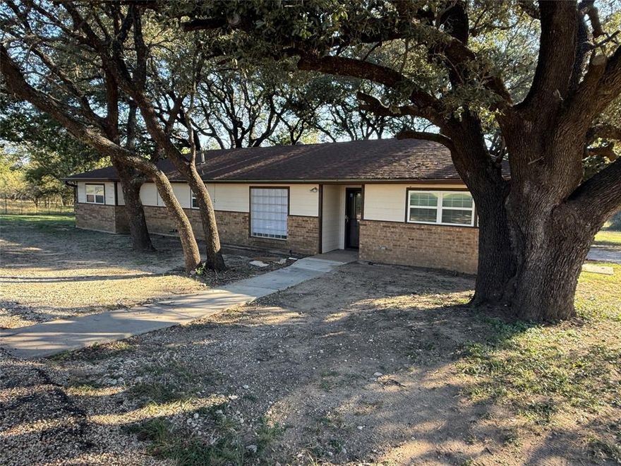 Beautifully Updated 3 Bedroom, 2 Bath Home on 2.09 Acres
This charming property offers the perfect mix of country living and modern comfort! Sitting on 2.09 acres, it features a private circular driveway, spacious front and back yards with recently trimmed native trees, and a storage building for extra space.
Enjoy excellent energy efficiency — the large solar panels feed directly into the power grid, helping reduce your monthly bills, while smaller solar panels charge batteries located in the laundry room that can run two refrigerators and a large freezer during a power outage.
Smart exterior lighting surrounds the home and can be controlled through an app, allowing you to customize colors and effects year-round — perfect for holidays or everyday ambiance, no need for Christmas lights!
Additional features include: Two-car covered attached carport, Large back porch for relaxing or entertaining, Septic and private water well, Exterior security cameras and fingerprint locks, plus couches and large wooden dining table convey
A survey is also available.
This home is move-in ready, energy-efficient, and filled with thoughtful upgrades — a true must-see!