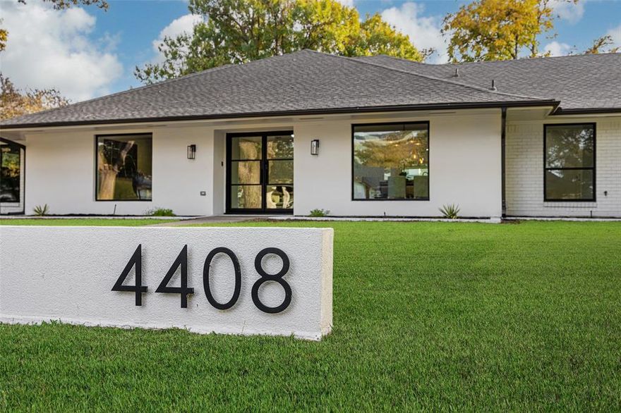 Experience modern luxury in a prime location in this STUNNING, LIKE-NEW, MOVE-IN READY REMODEL! Situated on a .35-acre pool-sized corner lot in Dallas’ coveted Private School Corridor— 4408 Thunder is just minutes from upscale shopping, fine dining, golf, hospitals, major highways, airports and suburbs. Anchored by mature trees and a stucco-and-brick exterior, this thoughtfully remodeled ranch-style stunner offers a 4-bedroom, 4-full bath layout with three en-suite configurations— and a separate private study aligned with an open-concept floor plan designed for modern living and entertainment. Through wi-fi enabled double iron doors, you’re greeted by vaulted ceilings, white oak floors, designer lighting, a sleek fireplace and a sophisticated dry bar with a wine fridge. The open concept living area flows effortlessly into the chef’s kitchen boasting an 8-burner double-oven range, side-by-side fridge, waterfall quartz island-backsplash, custom cabinetry, and a coffee bar. Complementing the kitchen is the walk-in butler’s pantry equipped with a secondary sink, trash can, microwave drawer, ice maker and quartz counters ideal for meal prep, hosting and entertaining. The sanctuary-like owner’s suite offers a cozy sitting area, a pot filler for morning-brew, a walk-in closet and direct access to an expansive covered patio— while the spa-inspired wet room comes complete with large format tiles, double sinks, freestanding tub, triple mode shower, smart bidet toilet, dressing mirror and second closet. Pet lovers will appreciate the mudroom that houses a built-in dog wash and sleep area. Beyond the beauty, notable major remodel details include— foundation, new AC ducts- vents- boots, attic insulation, PVC-PEX plumbing, tempered- energy efficient windows-doors, solid core doors, all-new electrical wiring- outlets- plugs- switches, upgraded electrical panel, interior-exterior LED lights. and more. This remodeled gem offers modern living at its best. Make this home yours today!