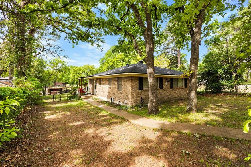 LIVE YOUR BEST LIFE ON THE LAKE! ADORABLE LAKEFRONT COTTAGE ON HUGE LOT WITH TWO-STORY BOAT DOCK! Nestled in among the trees is your very own private waterfront oasis! Starting with ample parking, this home is equipped to host all of your guests! Step inside to find a thoughtfully designed floor plan which includes an adorable kitchen with granite counters and breakfast island.  Large dining nook opens to living area with pretty wood burning fireplace.  All bedrooms are generously sized and having an extra half bath is a BONUS! If you prefer to enjoy lounging indoors, the sunroom is climate controlled for year round enjoyment! Plumbing and electrical was all updated within the last 4 years and a NEW ROOF IN 2026!  Step outside to find a fenced yard with separate dog run. GORGEOUS shade trees and plenty of greenery along fence line for extra privacy! Firepit for cozy camp fires plus plenty of space to play and enjoy life outdoors! Two story boat dock has a newer upper deck for sun bathing and sunset watching! Seawall was also recently replaced!  Ample storage for boats and other lake toys! Community offers private ramp and dock for residents & guests too! Eastwood Islands subdivision is conveniently located near plenty of shopping and dining in Gun Barrel City. Situated 60 miles southeast of Dallas it rests on the banks of Cedar Creek Lake. Residents here enjoy a relaxed, casual atmosphere in a beautiful wooded residential neighborhood. Golfing, boating, fishing, kayaking, are just a few of the outdoor activities that encompass the lifestyle in this community! It’s not just the name that makes Gun Barrel City a special place! It is a growing community of 7,500 people who choose to raise their families, start a business, or retire on the 4th largest lake in Texas! Gun Barrel City has been named a Go Texan Certified Retirement Community and is also served by the top-rated Mabank Independent School District. You will LOVE living here! HURRY!
