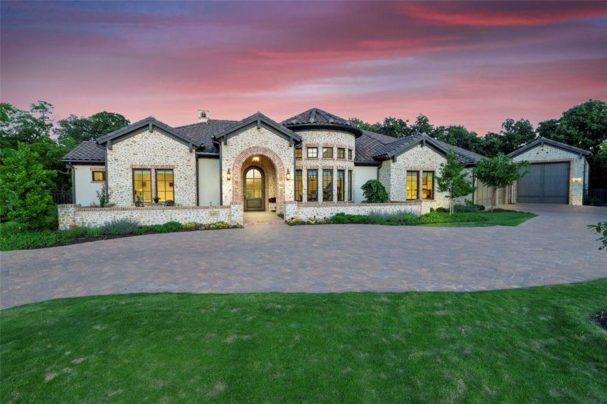OPEN HOUSE SUNDAY SEPTEMBER 28TH 1:00-3:00. Rare opportunity to own this home in highly desired Stony Brook! This single-story masterpiece, crafted by an award-winning builder, offers the perfect blend of luxury, privacy, and smart living. Tucked away on a quiet cul-de-sac and backing to a peaceful greenbelt, the setting is both scenic and serene. Inside, you'll find four spacious bedrooms, each with its own private en-suite bath, making this home ideal for comfort and convenience. A thoughtfully designed layout also provides multi-generational living opportunities, including a private suite option. The property features a separate oversized garage, perfect for RV storage or ready to be transformed into a custom-designed apartment, mother-in-law suite, nanny quarters, or even a private space for a college student or extended family member. The primary suite is a serene retreat with a spa-inspired bath, a massive custom closet, and a private flex room. High-end finishes, soaring ceilings, and lighting add a touch of sophistication throughout. Designed for entertaining, the chef's kitchen boast a premium 7 burner gas cooktop, premium dishwasher and built in  counter depth refrigerator. Custom cabinetry huge natural stone island and overlooking the main living space. An outdoor kitchen extends the living area with an inground pool and heated attached spa. Convenient prep-kitchen has double Wolf ovens, microwave and a  warming drawer.  The  RV garage bay has 3- 220v20a outlets and a full bath. The oversized 3 car garage has pre-wired 2- 220V60A for electric vehicle chargers, Smart features, lighting, Alarm,  security, fire suppression system, HVAC climate control, ensuring convenience for modern seamless control of lighting, climate and security. Owner owned 9.6 kV solar panel system with a 25 year warranty. This home is zoned in Keller ISD with open enrollment for Carroll ISD, offering top-tier educational opportunities. Luxury, privacy, and cutting-edge design.