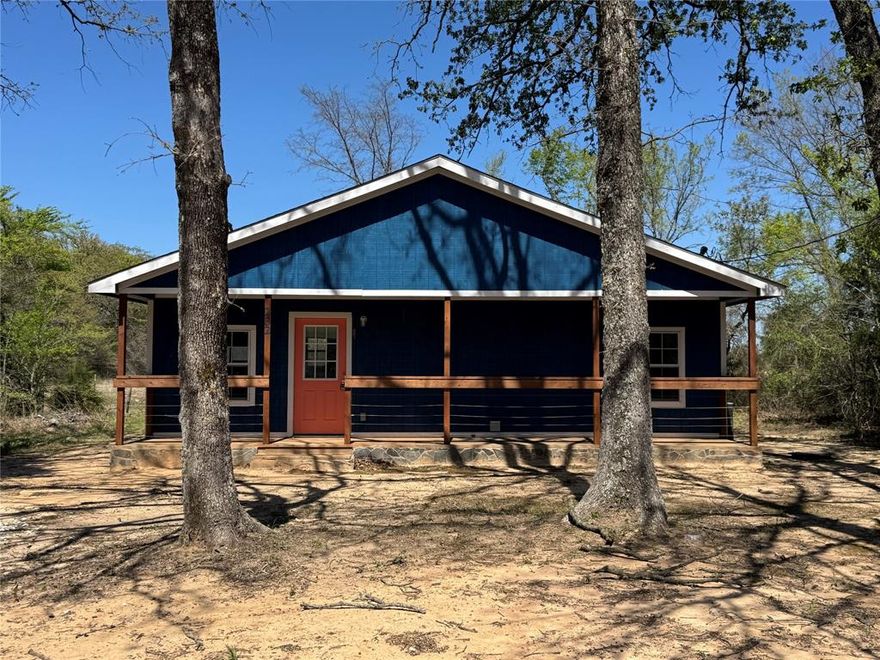 If lake life is calling your name, this Cedar Creek Lake retreat is ready to answer. Tucked away with charm and ease, this 2-bedroom, 1.5-bath home is designed for laid-back weekends and everyday escapes.  Start your mornings with coffee on the front deck and wind down in the evenings on the back, both perfectly suited for soaking in the peaceful surroundings. Inside, the spacious kitchen is built for gathering—featuring sleek Samsung stainless steel appliances, including a self-cleaning air fry convection oven, dishwasher, and refrigerator with ice maker—all Wi-Fi enabled and Energy Star rated.  The thoughtfully designed layout includes two bedrooms connected by a Jack-and-Jill bath, while the primary suite offers a true retreat with a large walk-in closet and a beautifully finished bath complete with tile flooring and an oversized 7' x 3' glass-enclosed shower.  With a full-size washer and dryer included and plenty of space to relax, this home makes it easy to embrace the slower pace, fresh air, and simple pleasures that come with life at the lake.