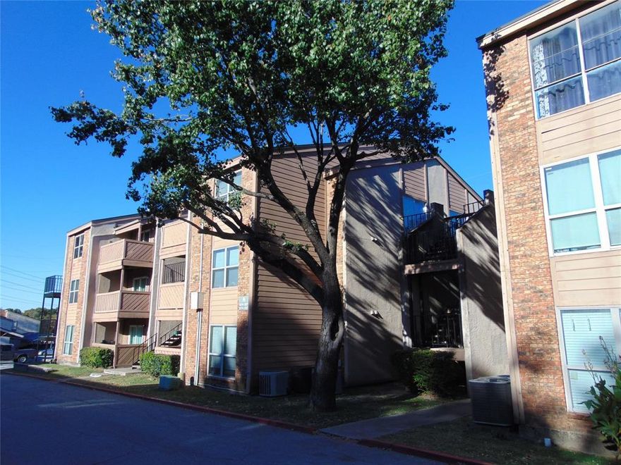 PRICED TO SELL!  WOW, WHERE ELSE CAN YOU GET A 2 BEDROOM CONDO FOR THIS PRICE!  Property has some updates but still needs your finishing touches.  Priced as an AS-IS sale.  Generous living area.  Kitchen has appliances. Hard surface floors throughout.  Full-size WD connections. Outside you have secured access gates and covered, reserved parking.