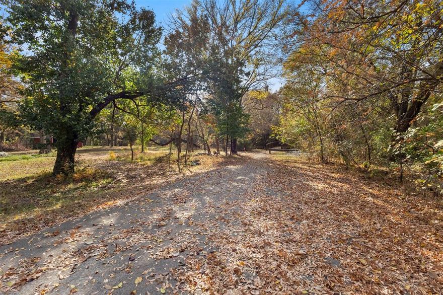 A rare chance to secure your own wooded escape in the serene and sought-after Pecan Acres community. FEMA has designated this lot as being within a floodway; therefore, the Town of Flower Mound is not issuing building permits at this time. The property is zoned to top-rated schools and comes with no HOA. Immerse yourself in the natural surroundings and enjoy the tranquility this area offers. West Windsor Park and the Indian Paintbrush Trail sit nearby, providing easy access to outdoor recreation. The River Walk—complete with scenic waterways, shaded walking paths, parks, dining, retail, event space, and an outdoor amphitheater—is within walking distance. Grapevine Lake, Lake Lewisville, and DFW Airport are only minutes away for added convenience. The neighboring parcel at 4805 Mesquite (.384 acres) is also available. Buyers are responsible for verifying all details and directing any questions to the Town of Flower Mound.