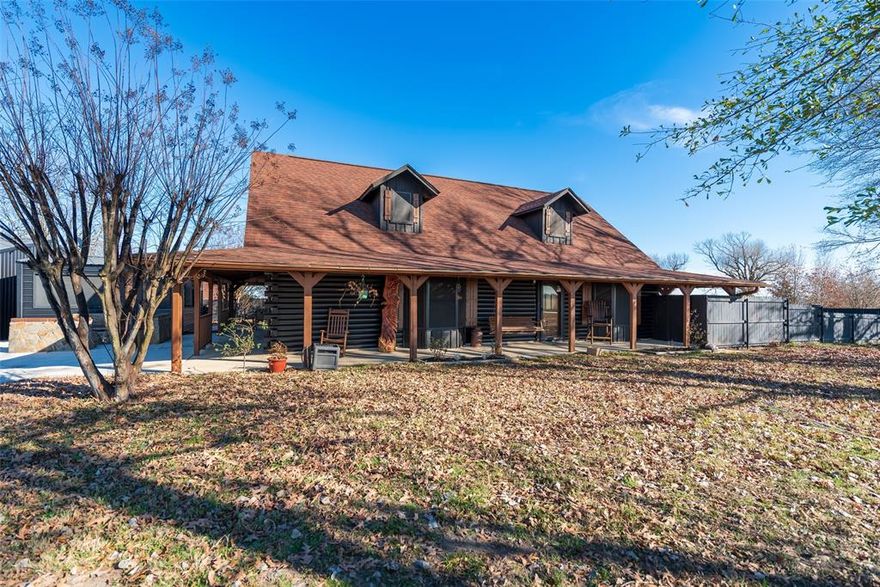 Tucked away on 6 peaceful acres in Mount Vernon, this stunning log home blends rustic charm with resort-style living. Enjoy two private ponds—one with a covered dock and the other with a bridge to a gazebo—plus a gunite pool, hot tub cabana, and firepit area. Inside are 3 bedrooms, 2.5 baths, warm wood accents, and a modern kitchen with an island and stainless steel appliances. A wrap-around porch offers the perfect sunset view. Outside features include two workshops, two carports with storage, a detached apartment with full living quarters, and a treehouse with electricity and AC—a unique bonus for guests or play. Peaceful, private, and full of East Texas character—this one has it all!