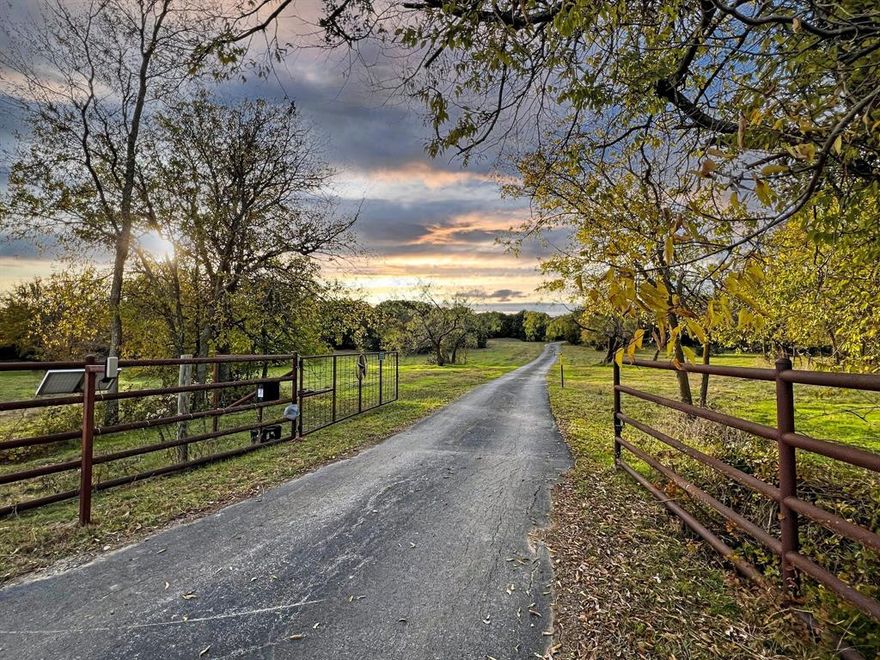 Serenity at it Best! This beautiful paved road invites you in to the quiet tranquil surroundings that flow through this cozy home nestled right in the middle of nearly 33 spacious acres with abundant deer and wildlife. Even though you are just about 12 minutes from the growing town of Mineral Wells, you feel the freedom of being in the country, and Weatherford has everything you need, being just over 20 min drive. Bring your horses, and cattle, and shelter them with the barn that is already there! Keep your vehicles out of the weather with the covered 2 vehicle car port. The lighted shop has a climate controlled, insulated Man Cave for a relaxing escape! The yard is fenced around the house, along with perimeter fencing on all 4 sides.  The seasonal creek runs through the North side of the property as well as a beautiful tank. If you're looking for quiet, peaceful living and even a great homestead location, come take a look at this one!