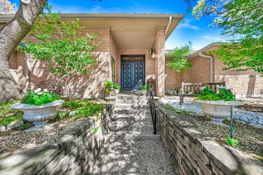 Rare opportunity in Oak Highlands Estates, one of Lake Highlands' most coveted, pocket neighborhoods. Easy access throughout Dallas with the finest shopping, dining & city amenities within minutes. Access Harry Moss Park at the end of your street & enjoy White Rock Trail connector to the lake, off-road hike-bike trails, soccer complex & more. Gather with family & neighbors to watch fireworks over nearby Royal Oaks Country Club. This classic, late mid-century, one story home on large 0.297 acre lot was thoughtfully designed for today's living with separate private bedroom wings, a bath for every bedroom, seamless outdoor-indoor transitions & natural light, sparkling pool & 3 car garage. The home is located in top-rated Richardson ISD, including renowned Moss Haven Elem. This lovely one-owner, architecturally forward-thinking, custom home has been lovingly maintained with many upgrades & has been thoroughly pre-inspected & repaired for buyer peace of mind. Features include 4 bedrooms with walk-in closets, 4.1 baths, 2 large living areas with cathedral ceilings, 2 large dining areas, beautifully updated kitchen with Thermador appliances & Calacatta Eureka marble counters, Italian tumbled marble tile floors, hardwoods, wet bar, huge laundry, floor to ceiling windows & refreshed Atrium which bring the outside in, impressive brick fireplace with gas starter, inviting pool with expansive covered patios, mature trees, professionally designed landscaping, 3 car garage, & front circle drive. Huge master suite in separate wing of the home features hardwood floors, sitting area with built-ins, dual primary ensuite baths, 2 walk-in closets with built-ins, & private access to pool deck. 2019 roof, 2024 elec panel, 2026 water heater, 2026 carpet in secondary bedrooms, 2026 pool sweep. With repairs made already, the home is priced to allow the buyer to move in & make any desired cosmetic changes over time or remodel now with confidence that the bones are solid. Don't miss this gem!