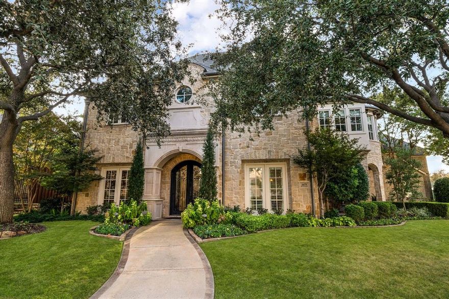 Situated on a corner lot in Chapel Creek, this expansive two-story home offers exceptional space, thoughtful design, and elevated finishes throughout. A striking stone façade, mature trees, and manicured landscaping create impressive curb appeal, complemented by a covered side patio. Inside, a grand foyer with tile floors and abundant natural light opens to multiple living and dining areas. The study features rich wood floors, custom built-ins, detailed wall molding, and a fireplace, while the formal dining and living rooms each showcase their own fireplace and elegant finishes. The kitchen is complete with granite countertops, large island, breakfast bar, Viking gas range with double oven, built-in refrigerator, walk-in pantry, and a temperature-controlled wine cellar nearby. The kitchen flows seamlessly into the breakfast nook and main living area, where vaulted ceilings with wood beams, a stone fireplace, and expansive windows overlook the backyard. A wet bar, mudroom with built-ins, and oversized utility room add convenience. The primary suite offers backyard access and a luxurious bath with dual vanities, jetted tub, oversized shower, and an impressive custom closet with island. Secondary bedrooms include en-suite baths and walk-in closets, providing comfort and privacy. Upstairs features multiple entertainment spaces including a game room with wet bar, a second game or golf simulator room, and a media room with projector capability. Dual staircases provide easy access. The backyard is an entertainer’s retreat with a covered patio, fireplace, built-in outdoor kitchen, screens, and a large pool and spa with water feature. A separate gated grassy area adds versatility, while the side-entry three-car garage includes epoxy floors and built-in storage. Located in highly sought-after Chapel Creek in Frisco, residents enjoy beautifully maintained streets and convenient access to top-rated Frisco ISD schools, parks, shopping, dining, and major commuter routes.