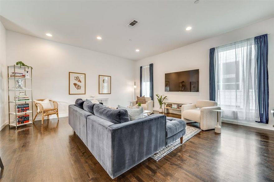 Newer construction, gated townhome-style condo in lower Greenville. 2 bed, 2.5 bath, with a private yard and a rooftop patio with views of downtown. This well-kept home has an awesome 2nd floor open floorplan with hardwood floors, incredible kitchen offering Bosch appliances including gas cooktop, added light from a unique window 'backsplash', large island with seating, tons of storage. Third floor hosts both nicely sized bedrooms with walk-in closets and en suite bathrooms. Great office area on the first floor. Tankless water heater, fire sprinkler system, small community walkable to all that vibrant Lowest Greenville has to offer!