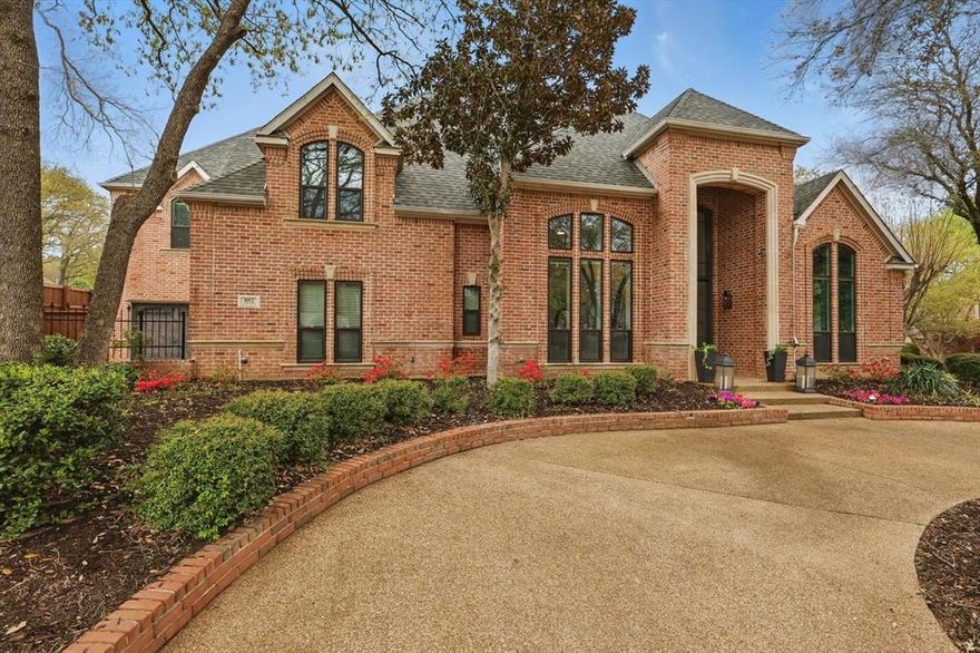 Prepare to fall in love with this beautifully appointed and extensively remodeled home that lies within the Exclusive Guard-Gated Community of Monticello Estates where mature trees surround miles of walking trails! The curb appeal wows with newly installed (2024) double & triple pane windows throughout the entire home. Upon entering you will find beautiful bamboo flooring throughout the first floor, bright & inviting open concept living spaces, and designer features and finishes throughout. The redesigned gourmet kitchen is an entertainer's dream with an eat-in kitchen, oversized island with quartzite counters, 48-inch Dual Range with pot filler, Decor column fridge and freezer and unobstructed views through the newly installed Steel Bifold doors of the backyard oasis. The formal living room, with built-in wet bar that includes a purification system, seamlessly opens to the formal dining, while the oversized remodeled family room and remodeled kitchen are the heart of the home. Enjoy four-seasons of entertaining with the incredible outdoor living that includes solar patio screens that lead to the newly remodeled sparkling pool and spa! The meticulously thought-of outdoor kitchen loaded with dual-tap kegerator, Bull Side burner, 42-inch Napoleon gas grill with Rotisserie, built in XL Green Egg, wood burning fireplace with gas starter and ceiling heater provide unlimited outdoor fun and entertaining! With a flexible floor plan that includes both primary and guest suites on first floor plus additional upstairs bedrooms, movie room, and game room, the home offers a great balance of comfort and entertainment. Enjoy all the luxuries of this immaculately maintained home plus all the comforts of two new HVAC units, new water heater and new paint throughout. This dream home has too many luxuries to list and is located in one of the most desirable neighborhoods of Southlake that includes tennis, pickle ball & basketball courts all within the gates!