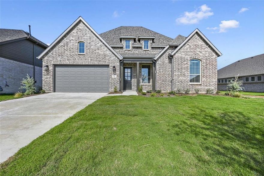 MLS# 20423743 - Built by Highland Homes - Ready Now! ~ Upgraded elevation! Wood flooring throughout the entry, all halls, study, family room, kitchen, dining area, and pantry. Upgraded carpet in the entertainment room, and all bedrooms and closets. The kitchen features stained cabinets, quartz countertops, decorative backsplash, white single bowl farmhouse style sink and black faucet. The spacious primary suite includes a separate tub and shower!!!