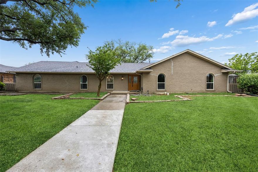 Location, location, location! Nestled in an established Carrollton neighborhood, this spacious 4-bedroom home sits on an oversized, heavily treed lot offering both privacy and room to enjoy. Inside, you’ll find a functional layout with multiple living and dining areas, ideal for both everyday living and entertaining. The home features generously sized bedrooms, including a primary suite with en-suite bath, along with flexible spaces that can easily accommodate a home office, playroom, or additional seating areas. Recent updates and well-maintained systems provide peace of mind, while still leaving opportunity for a buyer to personalize and add value over time. Large windows throughout bring in natural light and highlight views of the expansive backyard—perfect for outdoor gatherings, gardening, or future improvements. Conveniently located with easy access to major highways, shopping, dining, and highly rated schools, this home combines space, location, and long-term potential in one of Carrollton’s most desirable areas.