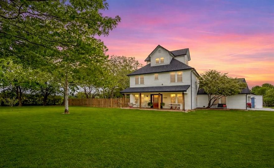 Rare opportunity to own a versatile 5-bedroom property, with casita, on 1.267 fully fenced acres in Pilot Point, offering the perfect blend of country living, modern upgrades, and income potential minutes from Ray Roberts Lake and major commuter routes. This beautifully maintained home features a completely remodeled 2023 interior with an open-concept layout, creating a bright and functional space ideal for everyday living and entertaining. Fully updated kitchen showcases custom white shaker cabinets, granite countertops, farmhouse sink, and abundant storage. Major system updates include a 2024 roof, and 2023 and 2024 HVAC systems; providing peace of mind and long-term value. Fiber optic internet and smart home features deliver modern comfort and connectivity. A major highlight is the 690 sq ft casita, a fully self-contained living space featuring a full kitchen, bathroom, oversized closet, and stackable washer and dryer, ideal for multi-generational living, guest quarters, dedicated office, or rental income opportunity to offset your mortgage. A standout feature is the foam-insulated 50-foot barn with electricity, currently set up as a woodworking shop with additional rafter storage, perfect for hobbyists, small business owners, or anyone needing workspace on-site. Outdoor features include privacy with 8-foot board-on-board fencing, mature trees, RV hookup, chicken coop, and a dedicated garden space with raised beds. The property also offers two fully functioning septic systems, including one with a 2023 septic pump. Enjoy an oversized outdoor patio, covered front porch with porch swing, and multiple seating areas, making this property ideal for a homestead, hobby farm, or to enjoy the wide open space. Pilot Point offers small-town charm with amazing nearby attractions.  Plus, you have easy access to Denton, Frisco, and major employment hubs.  
Properties offering this level of flexibility, workspace, and income potential on acreage are increasingly rare in DFW.