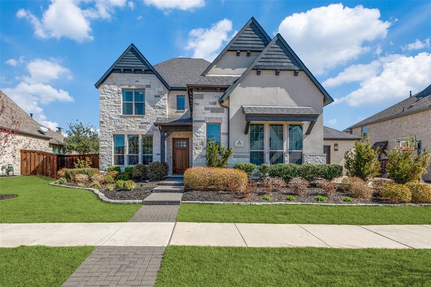 Shows Like a Model! Gorgeous Shaddock Home Situated on an Oversized Lot Located in the Sought After Edgestone at Legacy. One of Shaddock’s most desired model floor plans is loaded with numerous upgrades and built-ins at every turn. Gourmet kitchen with ample storage, oversized island, 6 burner range, dual dishwashers, planning desk and large walk-in pantry. Open concept family room is perfect for entertaining and offers a wall of windows overlooking the incredible backyard. Private primary retreat with the most gorgeous spa-like bath and huge walk-in closet. Guest suite and full bath on first floor.  Well thought-out upstairs floorplan offers a Texas-Sized game room, 3 spacious beds and walkout attic which is approx. 375 sqft unfinished media room. Enjoy full privacy on the extended outdoor living area with outdoor kitchen overlooking the generous backyard surrounded by professional landscaping. Rare 3.5 car garage is perfect for storage or Golf Cart! 2 New HVACs Aug 2025! Located in Frisco’s coveted Edgestone community, residents enjoy an exclusive clubhouse, fitness center, resort-style pool, walking trails, parks, & premier Frisco ISD schools, all minutes from Legacy West, PGA, The Star of Frisco, & world-class retail and dining.