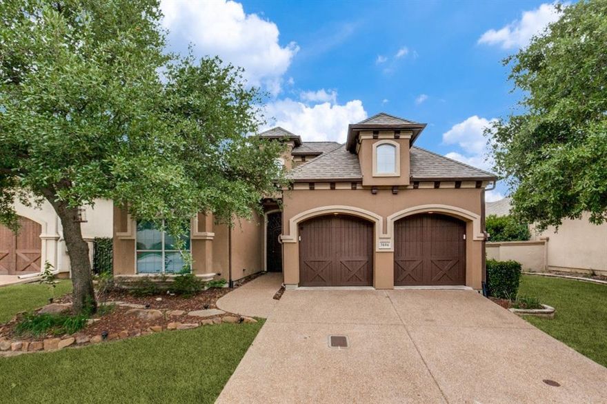 Discover this turn-key luxurious executive villa, nestled within the exclusive, private gated enclave of The Courtyards—a serene 23-home community bordering Addison. Offering effortless access to world-class dining, shopping & major thoroughfares, this residence delivers unparalleled convenience & privacy. Spanning primarily one level with a graceful, open-concept floor plan, the home features an upstairs bonus media room & full bath. A standout highlight is the separate casita overlooking the stunning oasis pool—complete with its own living room, spacious bedroom & full bath—ideal as a private guest suite, executive office, or family living quarters. Inside, expansive living & dining areas flow seamlessly into a gourmet kitchen, anchored by two fireplaces, rich built-ins, elegant crown molding, arched doorways, a butler’s pantry, and a dedicated bar with wine storage & fridge. Soaring windows frame a picturesque U-shaped courtyard, showcasing the sparkling pool, cascading water features, flickering fire bowls & a large covered patio. A dramatic wrought-iron private entry gate welcomes you into the foyer between the main residence and casita.  The chef-inspired kitchen boasts a gas cooktop, ss double ovens, a generous island with breakfast bar, farmhouse sink, abundant cabinetry & refined lighting. Just off the entry, elegant wrought-iron double doors open to a chandelier-lit study or wine room, adding timeless sophistication. The primary suite is thoughtfully split from the secondary bedrooms & opens directly to a private porch overlooking the pool. Its spa-like bath features a jetted tub, frameless walk-in shower, dual vanities, travertine flooring & an expansive walk-in closet with custom built-ins. In total, the home offers four full baths, laundry room with sink, a private side yard, sprinkler & security systems.  With its dormer windows, Juliet balcony above the gated entry & two-car garage, this exceptional home embodies refined Texas living at its finest.