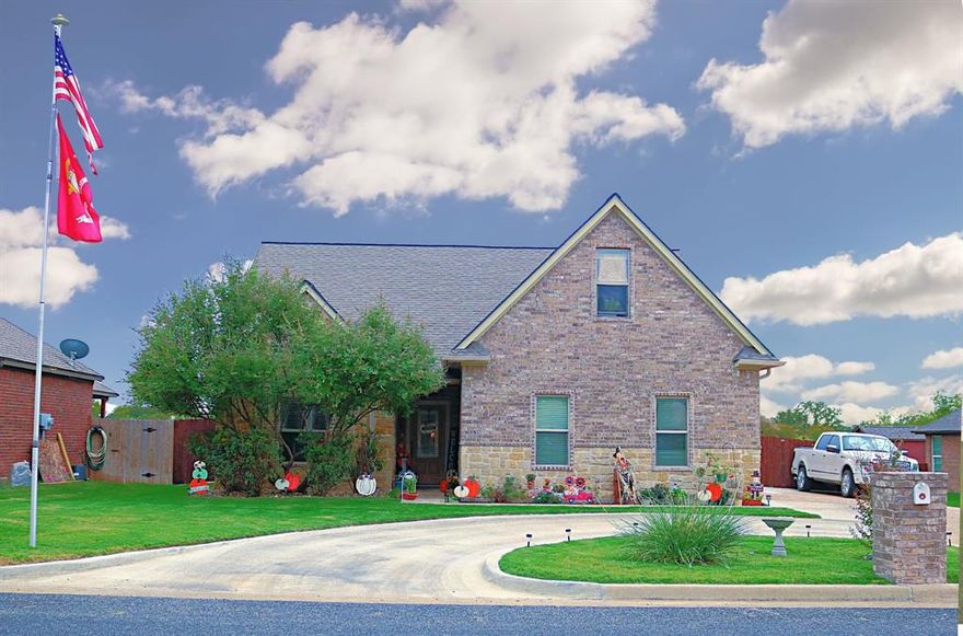 A beautiful Rocky Creek Builders custom home just outside Stephenville, TX awaits!
Step inside to discover a home where luxury meets practicality. The kitchen, adorned with elegant granite countertops is ready for family gatherings. The heart of the living space is warmed by a cozy gas fireplace, creating a perfect ambiance for those chilly Texas evenings. With four bedrooms, this home offers versatility and space for everyone. 
 The master suite is your own private getaway boasting plenty of space with a large walk-in closet and a bathroom that feels like your personal spa retreat. As you explore, you'll find not one, but three bathrooms, each offering a touch of luxury and convenience. There is ample storage, ensuring that you have plenty of room for your whole family. Step outside to a covered back porch that beckons family gatherings and peaceful evenings. There are no neighbors behind you, and the lot backs up to an open field. Excellent family neighborhood! Come check it out!