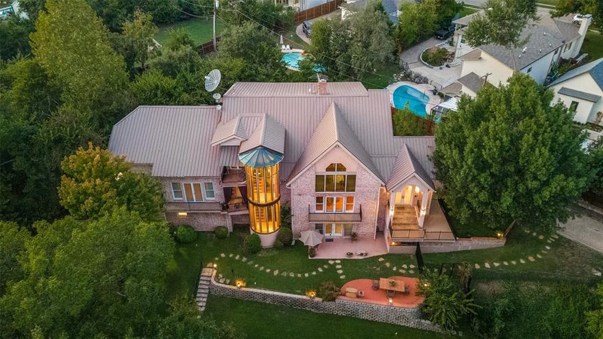 OPEN TO PUBLIC & AGENTS JANUARY 22, 11:00 to 1:00 DUE TO DEMAND. Value is in the land, with opportunity to build your own custom home.  Live a secluded lifestyle in the heart of Lakewood, one Dallas’ most prestigious neighborhoods. An incredibly private setting with 1.290 acres, 56,190 SF per Dallas Plat. This creekside property is hidden behind rolling lawns and mature trees, creating a private oasis in the middle of Dallas. Walking distance to Lakewood Elementary & White Rock Lake, this property includes two dwellings, the 6,570 SF main house & an 800 SF guest house. There are two listings for this property, one for land value and one for a residential sale.