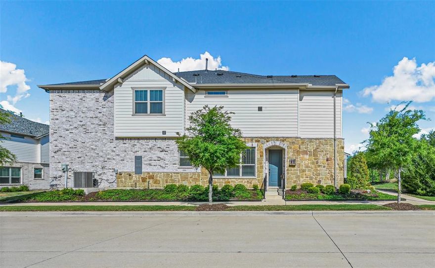 Move-in ready like new corner-end 3 bedroom, 2.5 bathroom two unit townhome with attached 2 car garage. The open floorplan is perfect for entertaining. The gourmet kitchen features granite counters, a spacious island, and stainless steel appliances. Custom-painted cabinetry complements the wood-look tile flooring and high-end tile finishes. Upstairs, the primary bedroom boasts a large walk-in closet and a luxurious bathroom with an oversized shower and separate vanities. This home has a fantastic split bedroom floor plan with a living area that could be used for a game room or office. Enjoy lower utility bills with energy-efficient features such as 12-inch+ attic insulation, energy-efficient windows, tankless water heater, and more! The yard is beautifully landscaped and maintained. Access to green spaces and the TEXRail station for easy commuting. Centrally located near major routes, dining, and shopping.