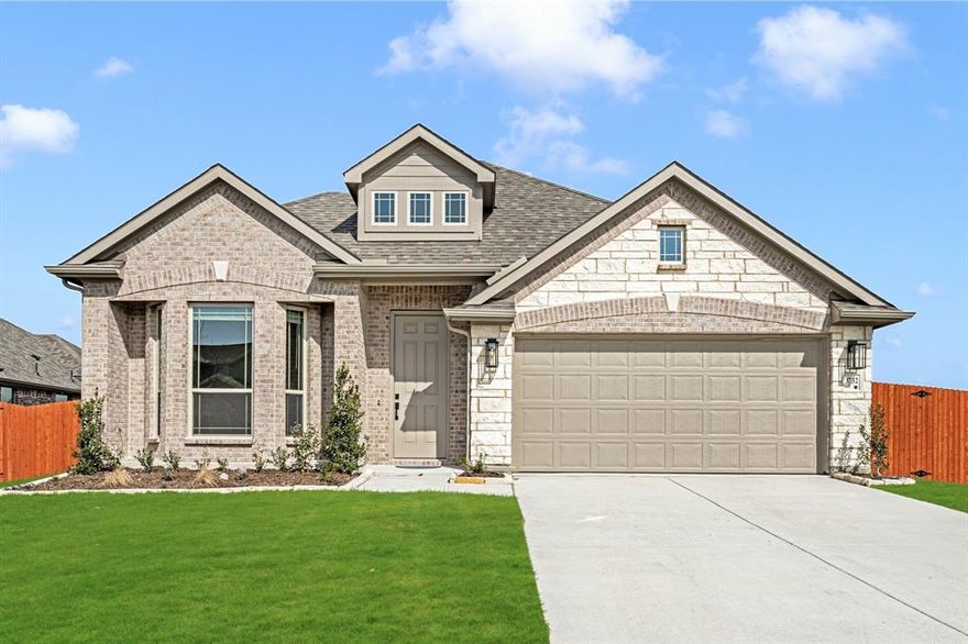 NEW! NEVER LIVED IN. Completed in 2025 & Reduced over $70K! Built by Bloomfield Homes, the Cypress II plan features 4 bedrooms and 3 baths across a flexible 1.5-story design. Set on an oversized homesite in Heartland, this home brings together clean brick-and-stone lines, an 8' front door, and thoughtful interior touches that feel fresh from the moment you walk in. Laminate wood floors guide you through an open main level where the Kitchen takes center stage with quartz surfaces, a large island, a walk-in pantry, and a built-in buffet at the breakfast nook that expands storage and prep options. The Family Room sits along the back of the home with backyard views and access to the covered patio for easy indoor-outdoor flow. The first-floor layout highlights a spacious primary suite with a sitting area and a well-appointed bath, while 2 additional bedrooms and a full bath branch conveniently from the main hall. Upstairs, a private game room pairs with an additional bedroom and full bath, creating a flexible zone that adapts to many different uses. Details like plush carpet in bedrooms, tile in wet areas, and generous closet storage add everyday comfort throughout. Heartland’s master-planned amenities include a large pool complex with slides, a fitness center, playgrounds, parks, and miles of trails woven through the community. Call or visit the Bloomfield Homes model in Heartland for details.