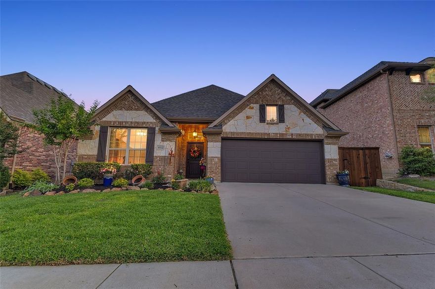 4512 Seventeen Lakes Ct in Roanoke, TX is ready for its next and second owner.  The home lives large with an open-concept main living area connected to the designer kitchen, a secondary living or game room that offers flexible space for media or play, and a dedicated front-of-house study that is ideal for working from home, homework, or a quiet retreat.  The kitchen was renovated in 2019 and features high-end, soft-close, dovetail-constructed custom cabinets that blend style and durability, creating a polished, upscale feel at the heart of the home.  The primary bathroom has been renovated within the last two years, adding a fresh, modern touch to the private owner’s suite and enhancing everyday comfort.  Additional thoughtful upgrades include an emergency water shutoff manifold in the garage that allows you to shut off water to specific rooms or locations, an automatic sprinkler system for easy lawn care, radiant barrier decking and ridge vents for improved heating and cooling efficiency, and 7.2 surround-sound wiring in the family room for an immersive media experience.  Outside, the home truly shines with a luxuriously updated and meticulously landscaped backyard, where layered flower beds, thoughtfully placed shrubs, and mature plantings frame multiple seating areas to create a private, resort-style retreat.  A tranquil koi pond serves as the focal point of the outdoor space, adding soothing water sounds and visual interest, and pairing beautifully with the hardscape to make the yard feel like an outdoor living room that is perfect for entertaining, relaxing, or enjoying quiet evenings at home.  Located in Seventeen Lakes, residents enjoy access to community lakes, walking trails, and green spaces, along with convenient routes to nearby employment hubs and amenities, making this home a compelling option for buyers seeking both comfort and lifestyle in Roanoke.
